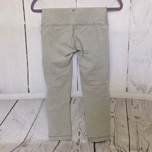Lululemon high waisted, cropped leggings fit like a size 2